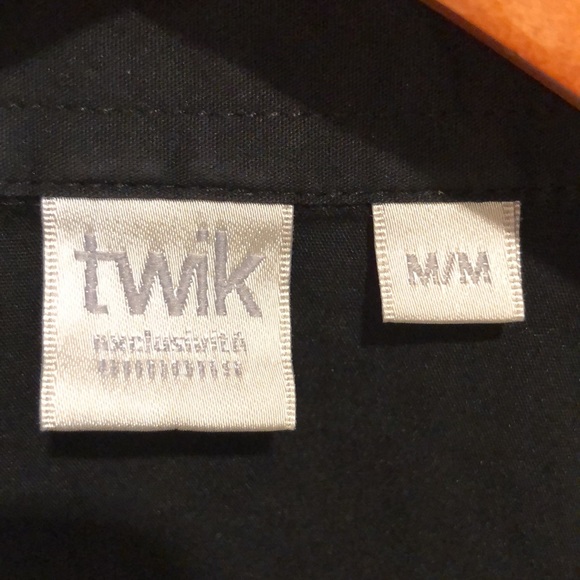 collared, button down sleeveless black shirt. - Picture 2 of 5